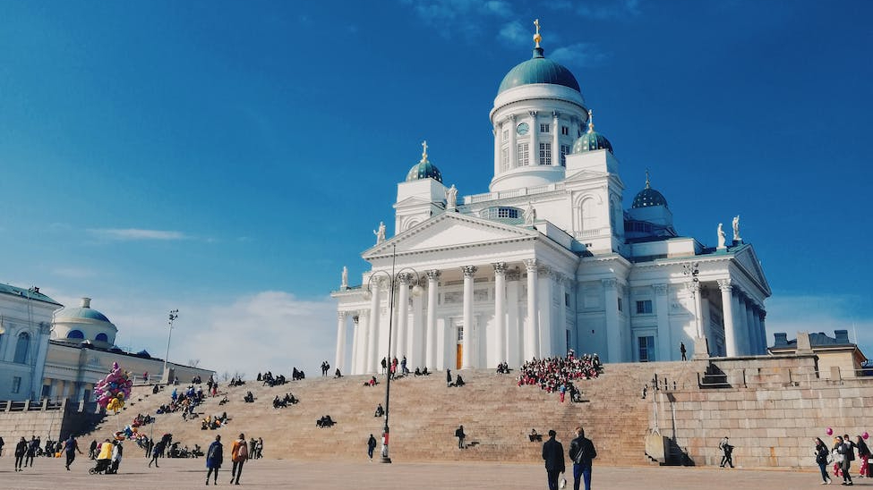 people walking near the church