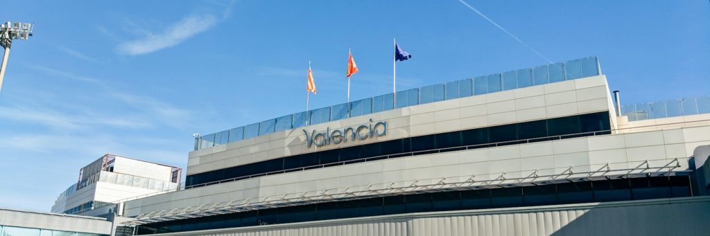 cars parked in front of building during daytime