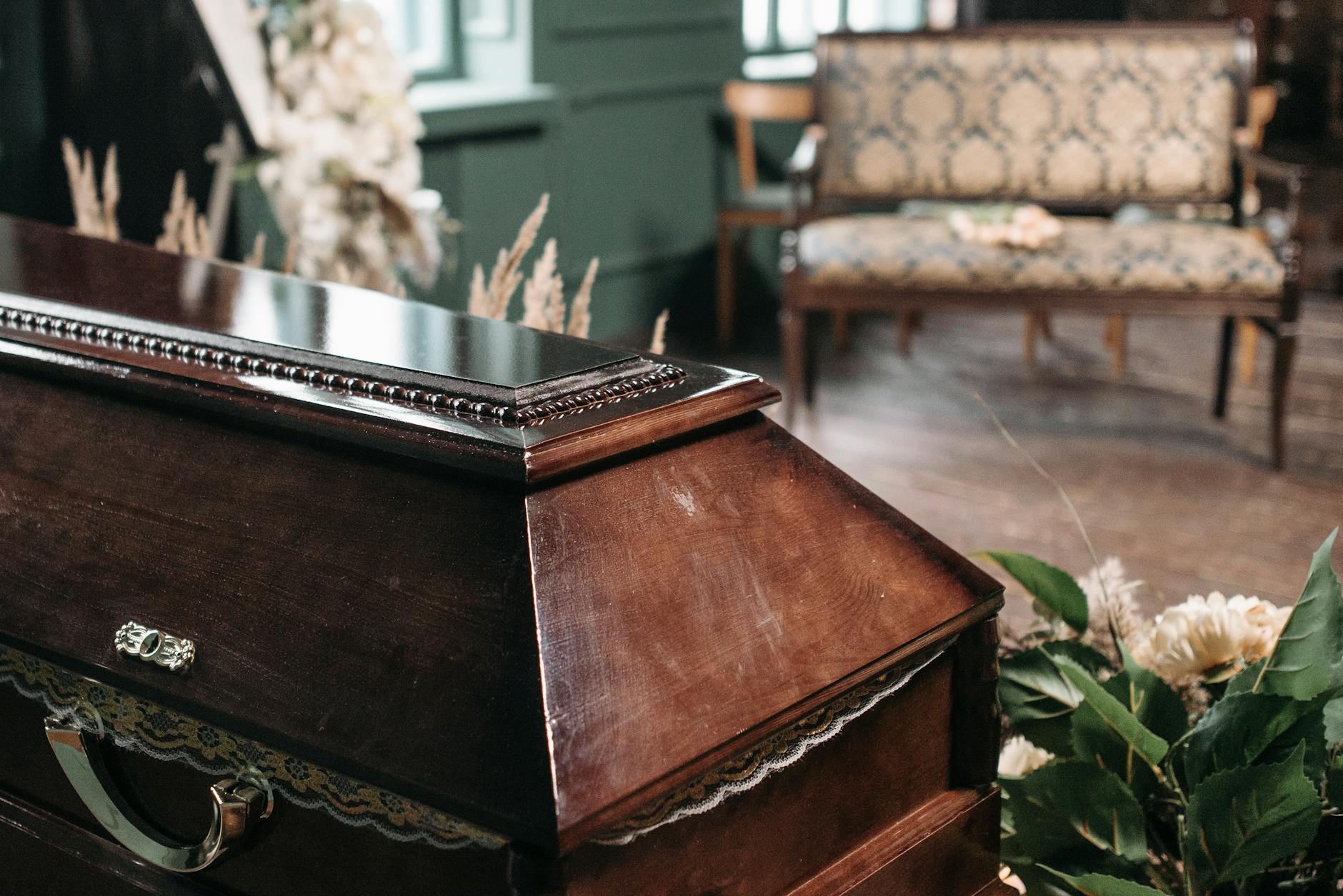 a brown wooden coffin