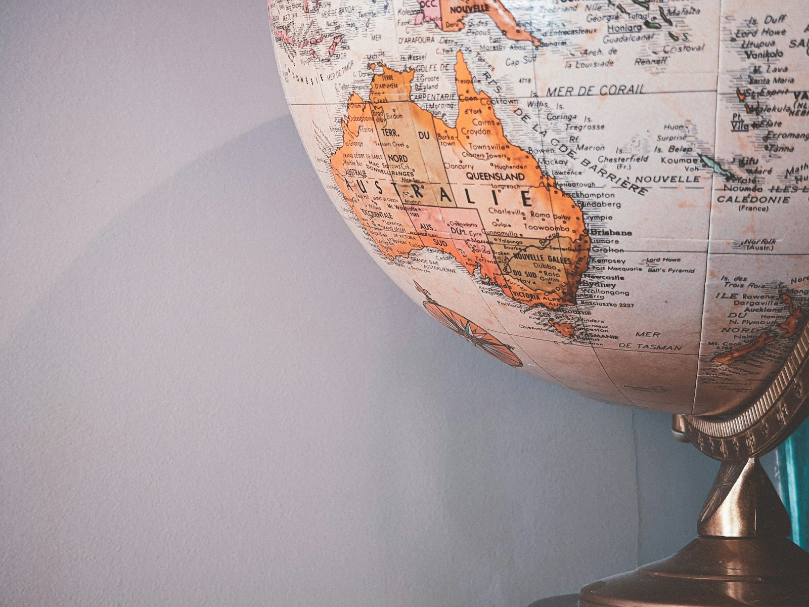 white and brown desk globe