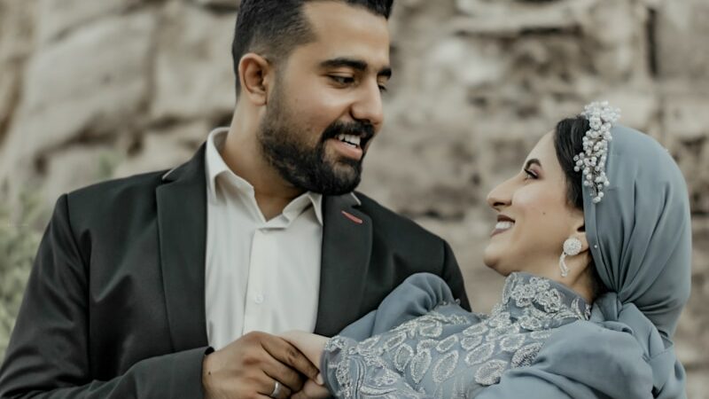 a man and woman posing for a picture