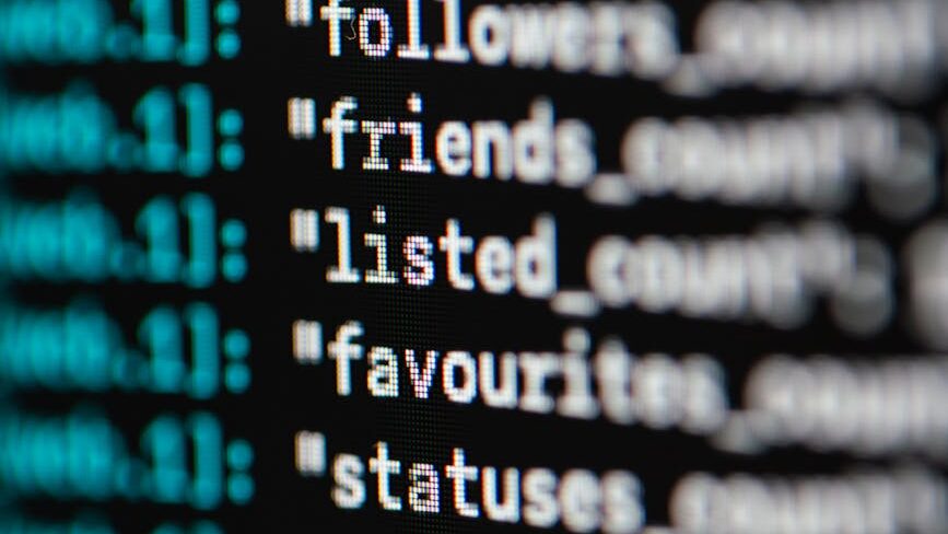 extreme close up photo of codes on screen