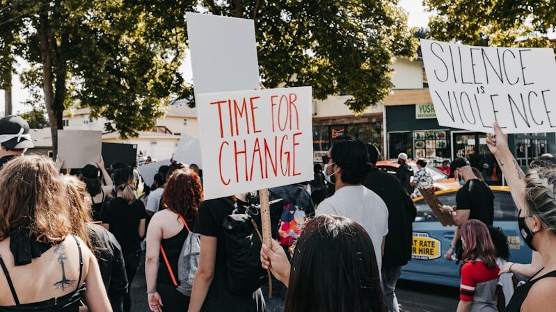 people standing on street during daytime